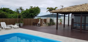 Отель Ap pe na areia em ingleses - Florianópolis SC  Флорианополис